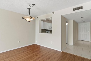 Beautifully updated first-floor condo with stunning golf course on Pinebrook/Ironwood Golf Course in Florida - for sale on GolfHomes.com, golf home, golf lot