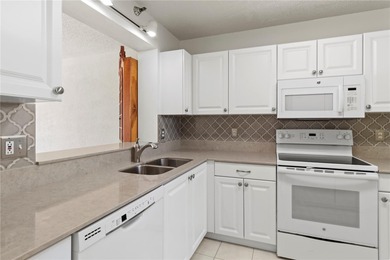 Beautifully updated first-floor condo with stunning golf course on Pinebrook/Ironwood Golf Course in Florida - for sale on GolfHomes.com, golf home, golf lot