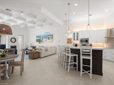 Gracefully positioned on an exceptionally private preserve on Bay Colony Golf Club in Florida - for sale on GolfHomes.com, golf home, golf lot