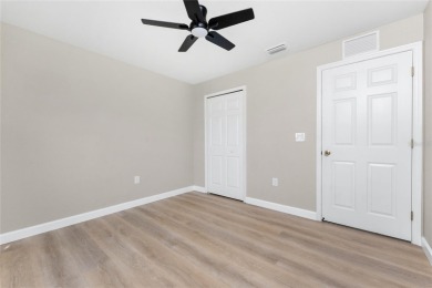 Welcome to this beautifully updated 3-bed, 2-bath pool home with on Duffys Golf Center in Florida - for sale on GolfHomes.com, golf home, golf lot