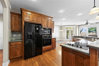 Custom Reverse 1.5 Story home situated perfectly on a private on Tiffany Greens Golf Club in Missouri - for sale on GolfHomes.com, golf home, golf lot