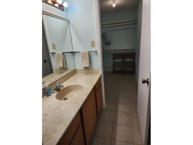 Turnkey downstairs unit in Rockport Country Club - fully on Rockport Country Club in Texas - for sale on GolfHomes.com, golf home, golf lot