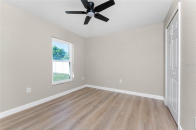 Welcome to this beautifully updated 3-bed, 2-bath pool home with on Duffys Golf Center in Florida - for sale on GolfHomes.com, golf home, golf lot