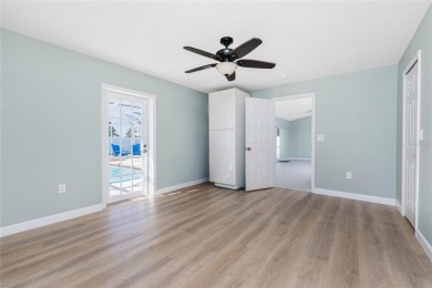 Welcome to this beautifully updated 3-bed, 2-bath pool home with on Duffys Golf Center in Florida - for sale on GolfHomes.com, golf home, golf lot