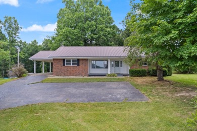 Embrace the golfer's lifestyle in this picturesque brick ranch on Beattyville Country Club in Kentucky - for sale on GolfHomes.com, golf home, golf lot