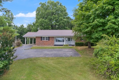 Embrace the golfer's lifestyle in this picturesque brick ranch on Beattyville Country Club in Kentucky - for sale on GolfHomes.com, golf home, golf lot