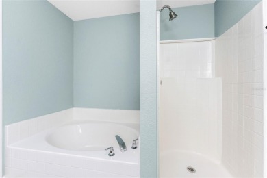 Welcome to this beautifully updated 3-bed, 2-bath pool home with on Duffys Golf Center in Florida - for sale on GolfHomes.com, golf home, golf lot