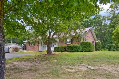 Embrace the golfer's lifestyle in this picturesque brick ranch on Beattyville Country Club in Kentucky - for sale on GolfHomes.com, golf home, golf lot