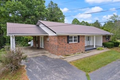 Embrace the golfer's lifestyle in this picturesque brick ranch on Beattyville Country Club in Kentucky - for sale on GolfHomes.com, golf home, golf lot