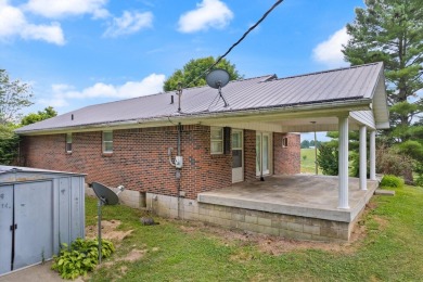 Embrace the golfer's lifestyle in this picturesque brick ranch on Beattyville Country Club in Kentucky - for sale on GolfHomes.com, golf home, golf lot