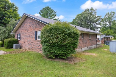 Embrace the golfer's lifestyle in this picturesque brick ranch on Beattyville Country Club in Kentucky - for sale on GolfHomes.com, golf home, golf lot