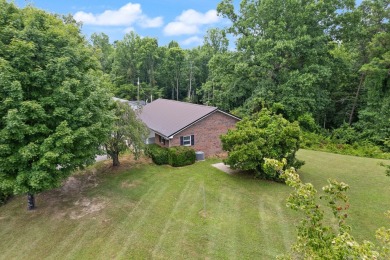 Embrace the golfer's lifestyle in this picturesque brick ranch on Beattyville Country Club in Kentucky - for sale on GolfHomes.com, golf home, golf lot