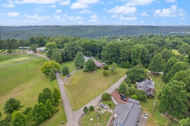 Embrace the golfer's lifestyle in this picturesque brick ranch on Beattyville Country Club in Kentucky - for sale on GolfHomes.com, golf home, golf lot