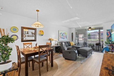 Spectacular remodeled first-floor condo with stunning lake view on Sunrise Lakes Phase III in Florida - for sale on GolfHomes.com, golf home, golf lot