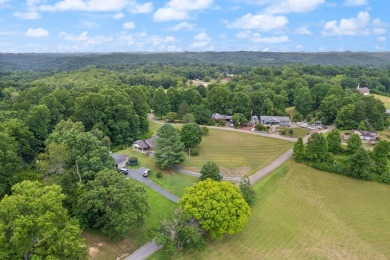 Embrace the golfer's lifestyle in this picturesque brick ranch on Beattyville Country Club in Kentucky - for sale on GolfHomes.com, golf home, golf lot