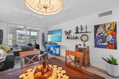 Spectacular remodeled first-floor condo with stunning lake view on Sunrise Lakes Phase III in Florida - for sale on GolfHomes.com, golf home, golf lot