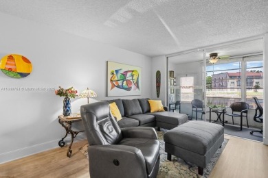 Spectacular remodeled first-floor condo with stunning lake view on Sunrise Lakes Phase III in Florida - for sale on GolfHomes.com, golf home, golf lot