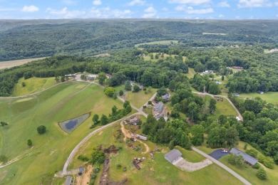 Embrace the golfer's lifestyle in this picturesque brick ranch on Beattyville Country Club in Kentucky - for sale on GolfHomes.com, golf home, golf lot