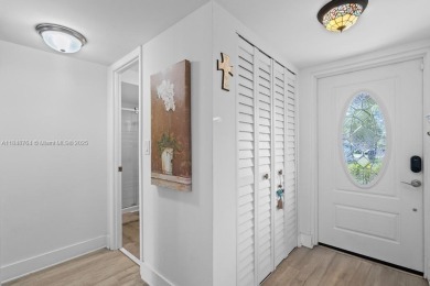 Spectacular remodeled first-floor condo with stunning lake view on Sunrise Lakes Phase III in Florida - for sale on GolfHomes.com, golf home, golf lot