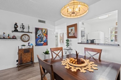 Spectacular remodeled first-floor condo with stunning lake view on Sunrise Lakes Phase III in Florida - for sale on GolfHomes.com, golf home, golf lot