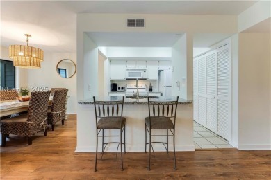 Freshly painted with new LVP and brand-new carpet in June 2023 on Palmetto Dunes Golf Course and Resort in South Carolina - for sale on GolfHomes.com, golf home, golf lot