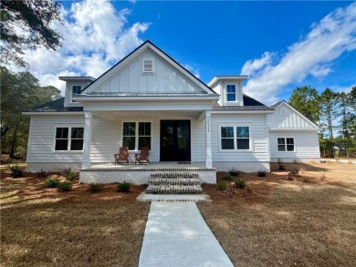 Come see what *Bluff Life* is all about! Adorable split ranch on Sapelo Hammock Golf Club in Georgia - for sale on GolfHomes.com, golf home, golf lot