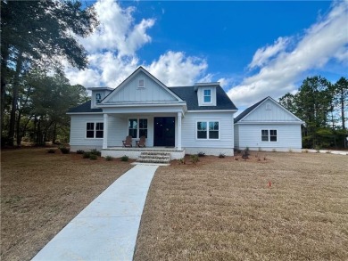 Come see what *Bluff Life* is all about! Adorable split ranch on Sapelo Hammock Golf Club in Georgia - for sale on GolfHomes.com, golf home, golf lot