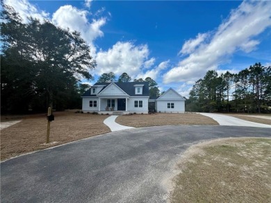 Come see what *Bluff Life* is all about! Adorable split ranch on Sapelo Hammock Golf Club in Georgia - for sale on GolfHomes.com, golf home, golf lot