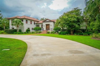 This Sea Island community home is a Spanish mediterranean on Sea Island Golf Club in Georgia - for sale on GolfHomes.com, golf home, golf lot