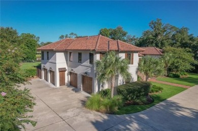 This Sea Island community home is a Spanish mediterranean on Sea Island Golf Club in Georgia - for sale on GolfHomes.com, golf home, golf lot