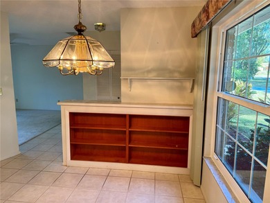 Come make this Highland Lakes home your own. Three bedrooms in on Highland Lakes Executive Golf Course in Florida - for sale on GolfHomes.com, golf home, golf lot