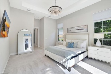 Indulge in modern luxury at this exquisite STOCK LUXURY home in on The Golf Club At Fiddlers Creek in Florida - for sale on GolfHomes.com, golf home, golf lot