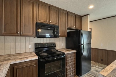 Your Lake Fork fishing retreat awaits in the gated community of on Links At Lands End in Texas - for sale on GolfHomes.com, golf home, golf lot