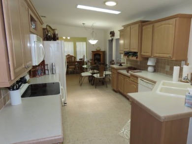New to market this1480 sf 2/2 Saddlebrook home located on the on Crane Lakes Golf and Country Club in Florida - for sale on GolfHomes.com, golf home, golf lot