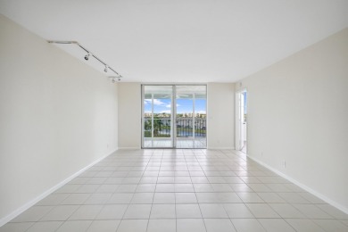 Discover comfort, convenience, and breathtaking views in this on Marina Lakes Golf Course in Florida - for sale on GolfHomes.com, golf home, golf lot