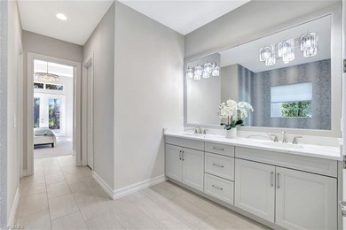 Indulge in modern luxury at this exquisite STOCK LUXURY home in on The Golf Club At Fiddlers Creek in Florida - for sale on GolfHomes.com, golf home, golf lot