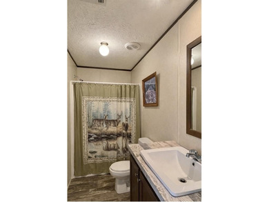 Your Lake Fork fishing retreat awaits in the gated community of on Links At Lands End in Texas - for sale on GolfHomes.com, golf home, golf lot