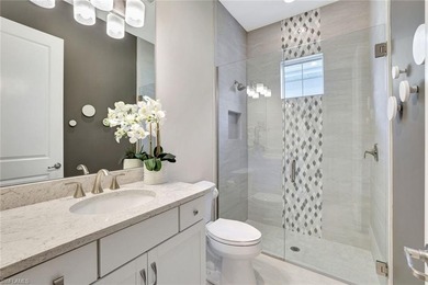 Indulge in modern luxury at this exquisite STOCK LUXURY home in on The Golf Club At Fiddlers Creek in Florida - for sale on GolfHomes.com, golf home, golf lot