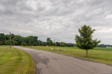 Vacant land in the prestigious Timber Point Estates ready for on The Timbers Golf Club in Michigan - for sale on GolfHomes.com, golf home, golf lot