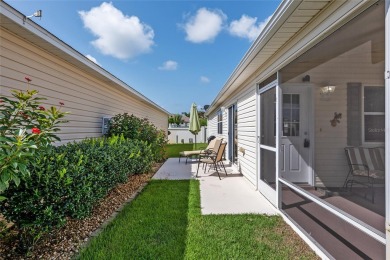 This 2/2 Cabot Cove Patio Villa is situated in the Village of on Truman Executive Golf Course in Florida - for sale on GolfHomes.com, golf home, golf lot