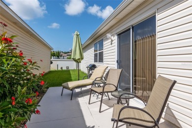 This 2/2 Cabot Cove Patio Villa is situated in the Village of on Truman Executive Golf Course in Florida - for sale on GolfHomes.com, golf home, golf lot