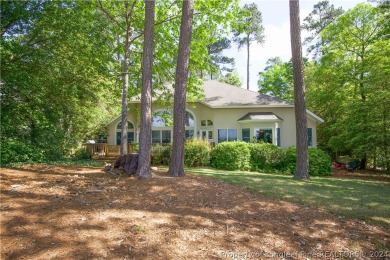 This 4-bedroom, 2-bathroom golf front home offers breathtaking on Woodlake Country Club in North Carolina - for sale on GolfHomes.com, golf home, golf lot
