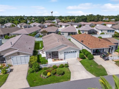 This 2/2 Cabot Cove Patio Villa is situated in the Village of on Truman Executive Golf Course in Florida - for sale on GolfHomes.com, golf home, golf lot