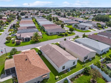 This 2/2 Cabot Cove Patio Villa is situated in the Village of on Truman Executive Golf Course in Florida - for sale on GolfHomes.com, golf home, golf lot