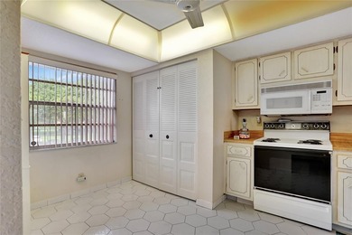 2 BR/2BA second floor residence in a well maintained 55+ on  in Florida - for sale on GolfHomes.com, golf home, golf lot