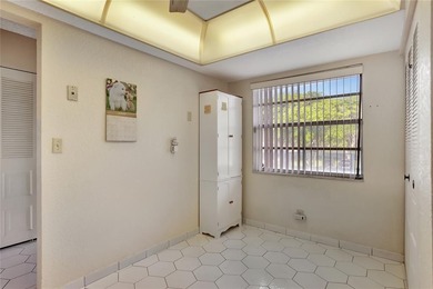 2 BR/2BA second floor residence in a well maintained 55+ on  in Florida - for sale on GolfHomes.com, golf home, golf lot