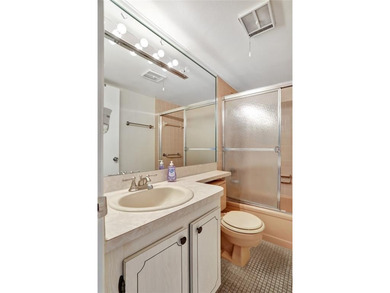 2 BR/2BA second floor residence in a well maintained 55+ on  in Florida - for sale on GolfHomes.com, golf home, golf lot