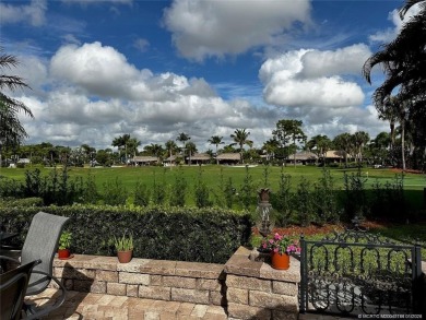 Truly an enchanting tropical retreat! Positioned on the on Motorcoach Resort Golf Course in Florida - for sale on GolfHomes.com, golf home, golf lot