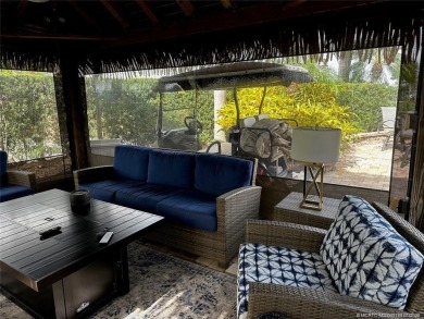 Truly an enchanting tropical retreat! Positioned on the on Motorcoach Resort Golf Course in Florida - for sale on GolfHomes.com, golf home, golf lot