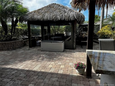 Truly an enchanting tropical retreat! Positioned on the on Motorcoach Resort Golf Course in Florida - for sale on GolfHomes.com, golf home, golf lot
